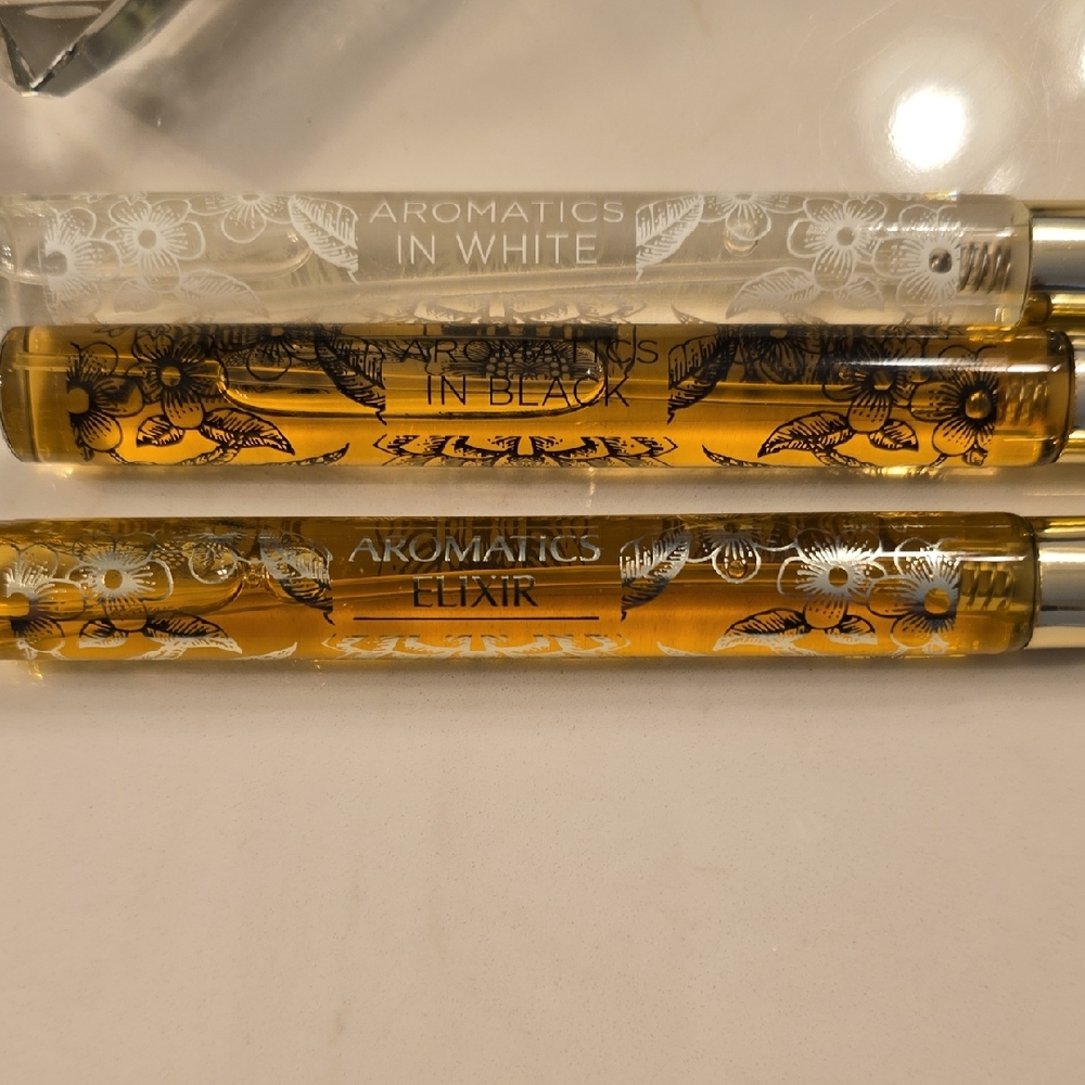 Clinique Elixir Perfume Set - White, Black, Gold